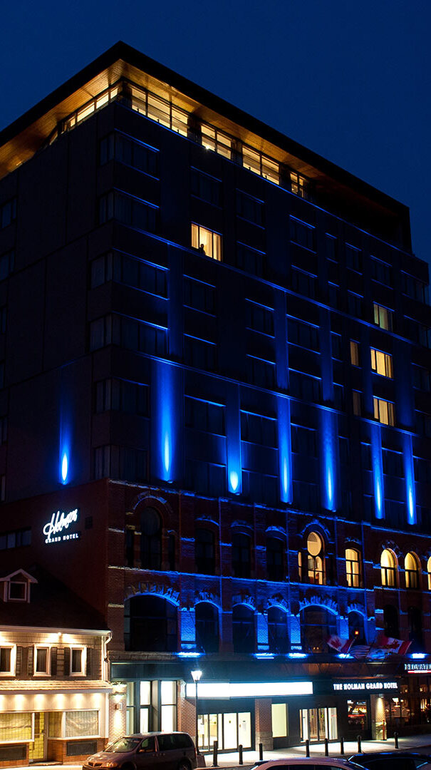The Holman Grand exterior at night